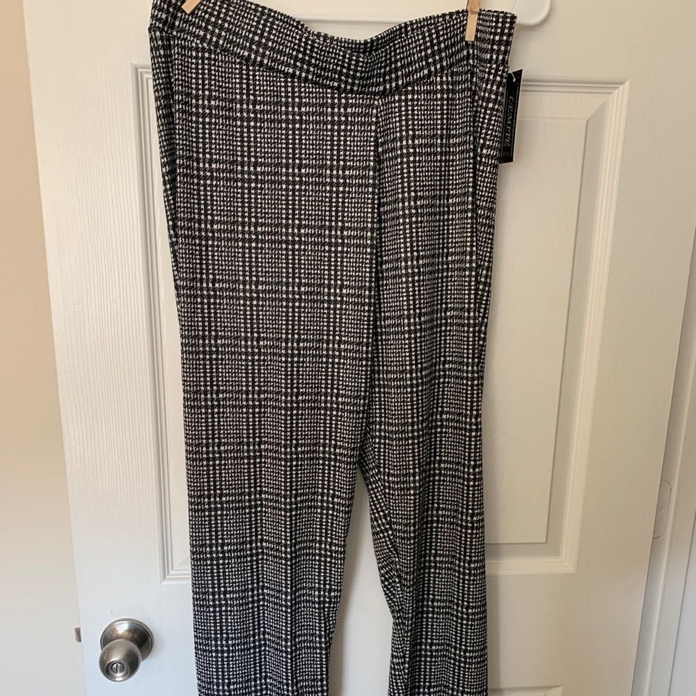 Black pants with white stripes